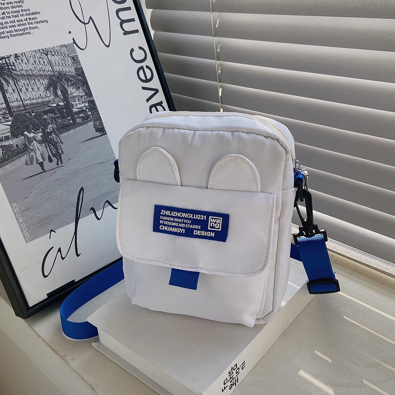 Túi Đeo Chéo Dáng Vuông Nhỏ Chất Liệu Nilon Màu Xanh Dương Mẫu Mới