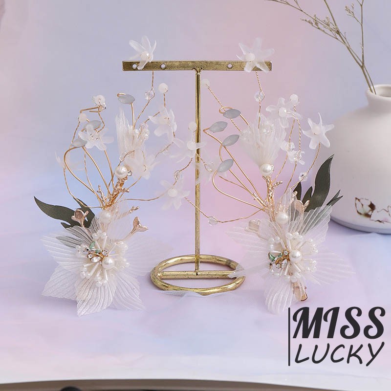 Khuyên tai và kẹp tóc cô dâu thời trang thanh tú