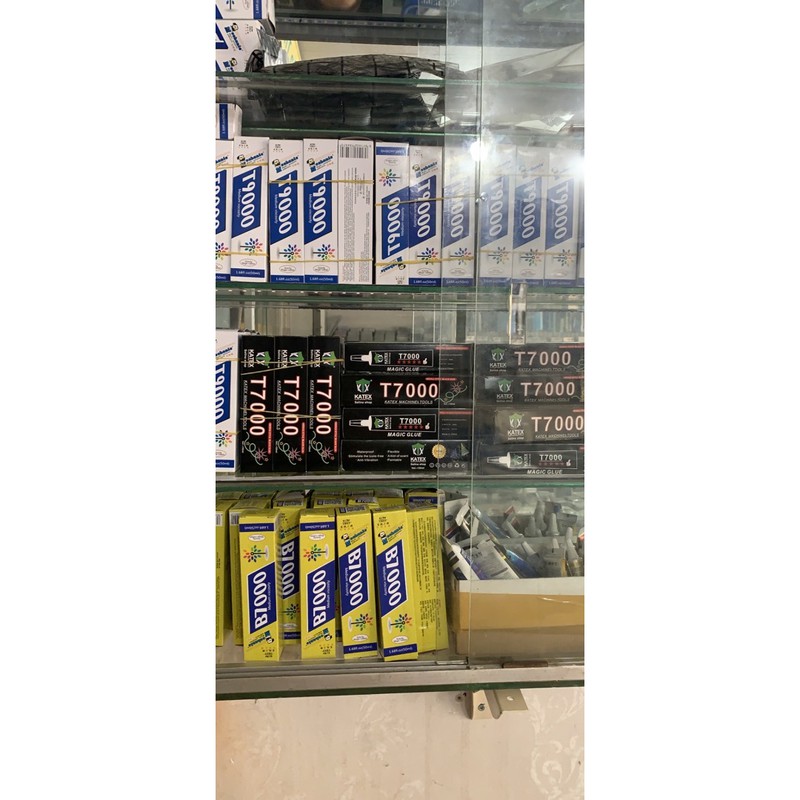 Keo dán điện thoại T-7000  T9000  B7000  E8000 chai lớn 50ml