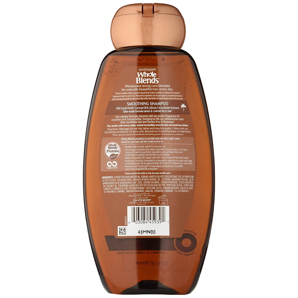 Dầu gội giúp mượt tóc chiết xuất dầu dừa &amp; bơ cacao Garnier Whole Blends Smoothing Shampoo 650ml (Mỹ)