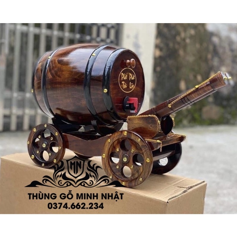 Xe pháo kéo bom trống gỗ