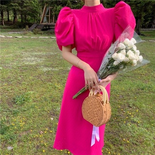 Đầm tiểu thư midi phối nơ lưng màu hồng cổ lọ