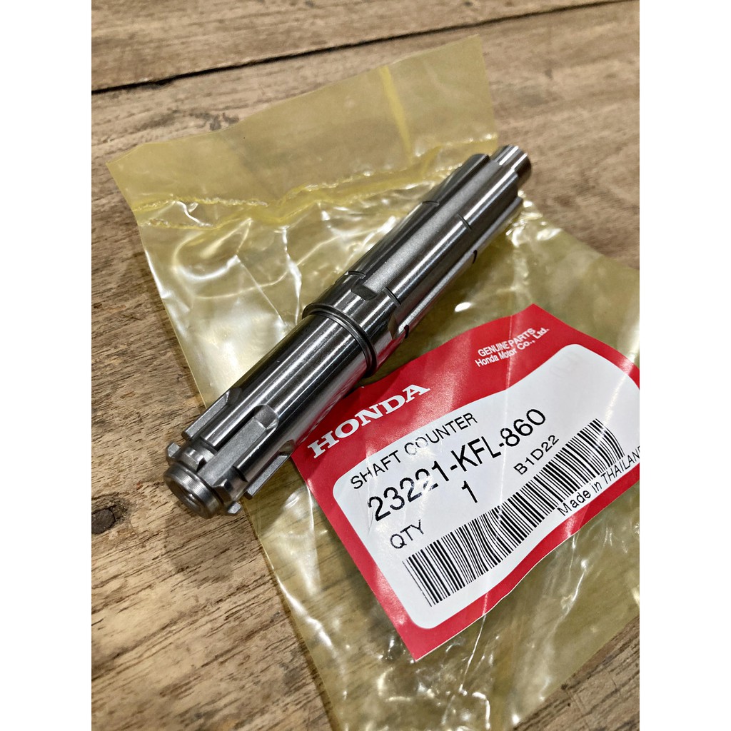 Trục bánh xích trước / Thạch cao (Chính hãng) Wave 100-S / 100 2005 (U-Box 2005) 23221-KFL-860