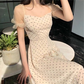 Đầm midi chấm bi phối tay lưới