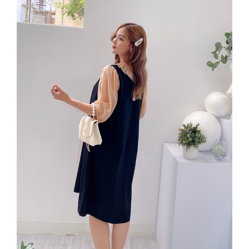 Đầm Bầu công sở đen viền hoa.