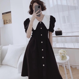 Đầm đen nút ngọc cổ trắng (kèm hình thật)