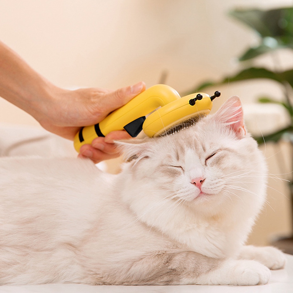 Lược chải lông chó mèo tích điện ong vàng có nút bấm cao cấp