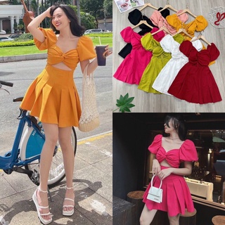 Đầm xoè xoắn ngực cutout eo tay phồng