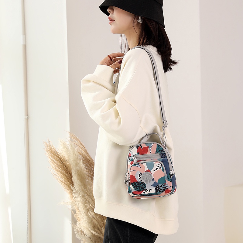 Túi Đeo Chéo Sợi Nylon Họa Tiết Hoa Phong Cách Mới Cho Nữ