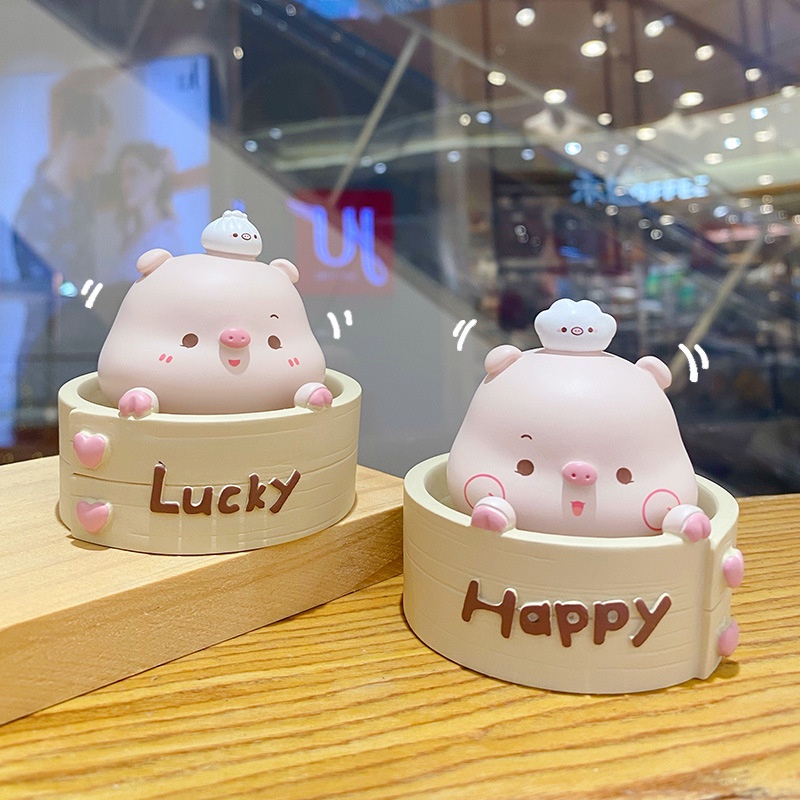 Mô hình heo hồng lắc đầu gật gù trong hũ Happy và Lucky biểu cảm dễ thương trang trí taplo ô tô, bàn làm việc, quà tặng