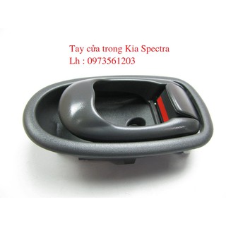 Tay mở cửa trong Kia Spectra -tặng vòng xoay hương hoa