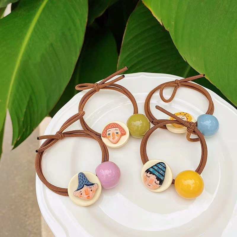 Dây cột tóc cao su đính hạt họa tiết mặt người hoạt hình thời trang Hàn Quốc trẻ trung dành cho nữ