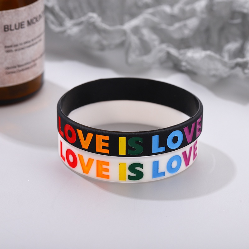 Vòng Tay Cặp Đôi Bằng Cao Su Mềm Màu Trắng Đen Chữ LOVE IS LOVE