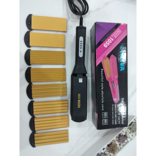 Máy làm tóc Guangming  8 lưỡi MS 1056