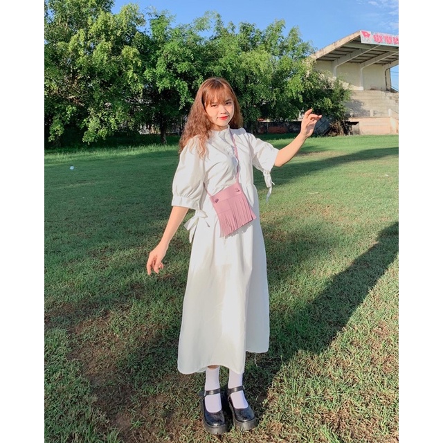 Đầm babydoll trắng form dài tay nơ