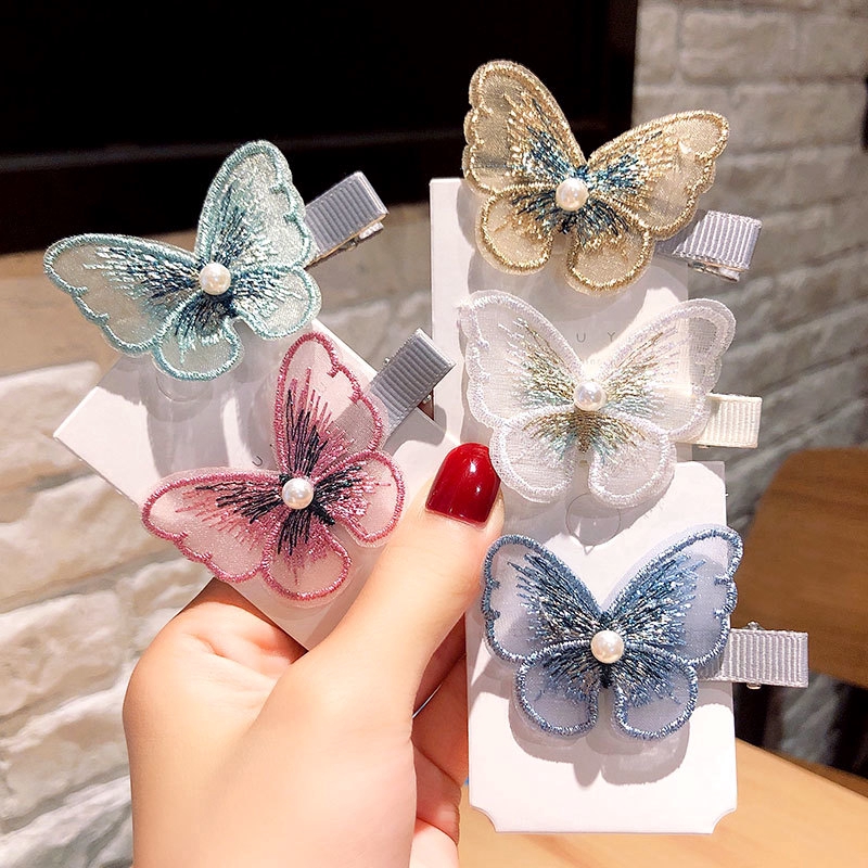 Kẹp tóc hình bướm đính ngọc trai giả xinh xắn cho nữ