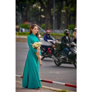 - Áo dài trơn 4 tà Chiffon kèm quần 2 lớp màu xanh mint đậm.