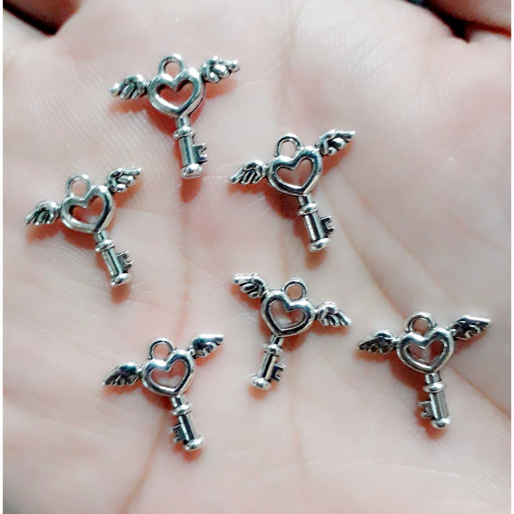 Phụ kiện charm bạc cổ ( 50g = 23k )