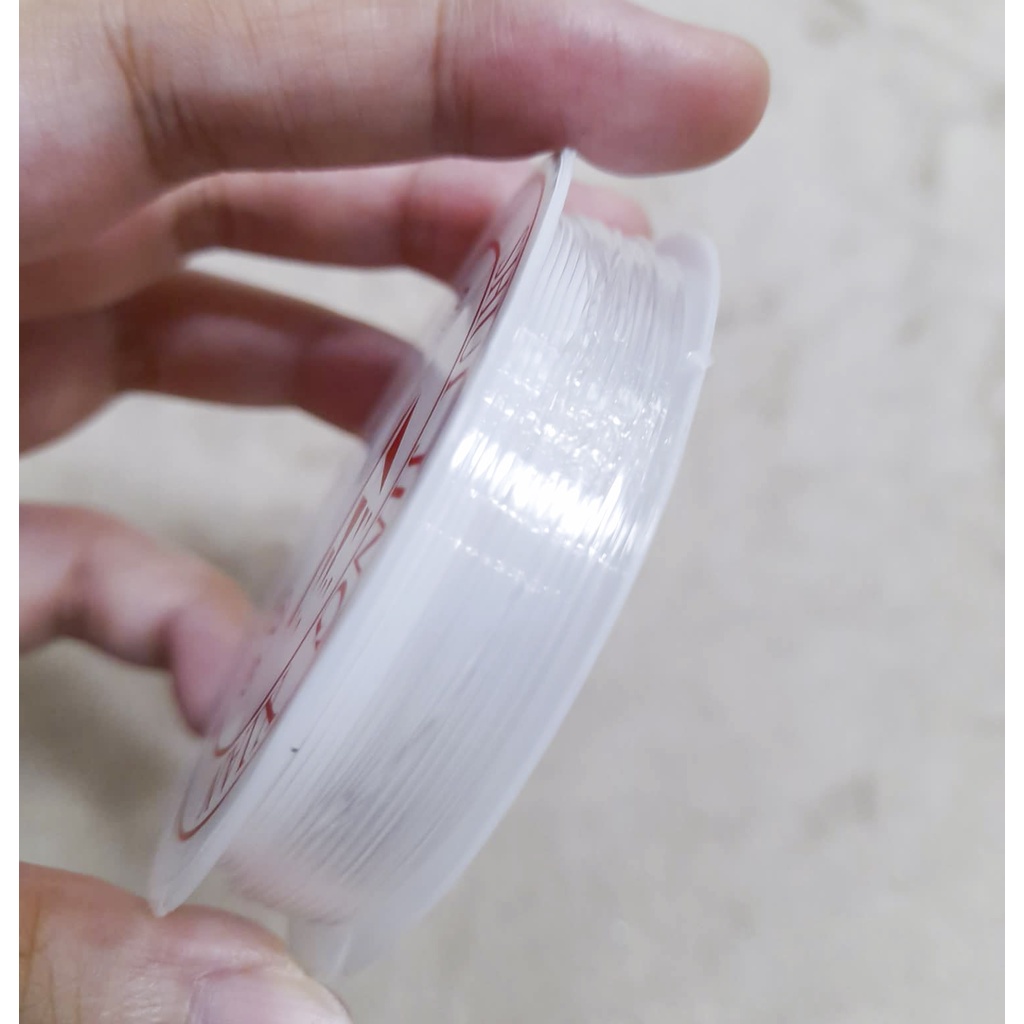 Dây cước trong suốt xỏ hạt loại mỏng cuộn 10m và day thun dẹp trắng đen 5m