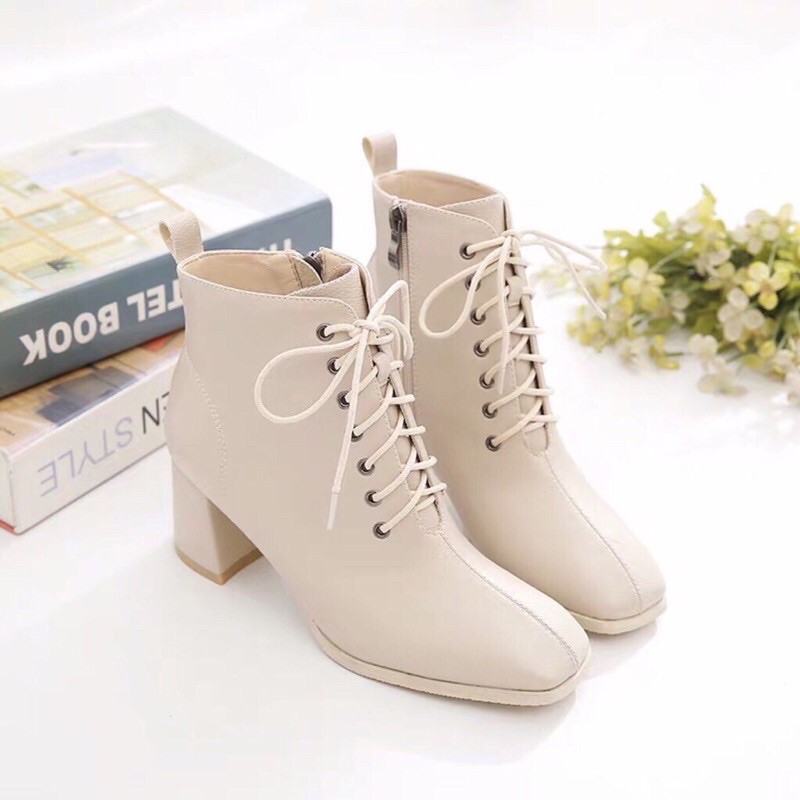 Bốt da nữ cổ cao dây Đan đế vuông cao 5 cm .