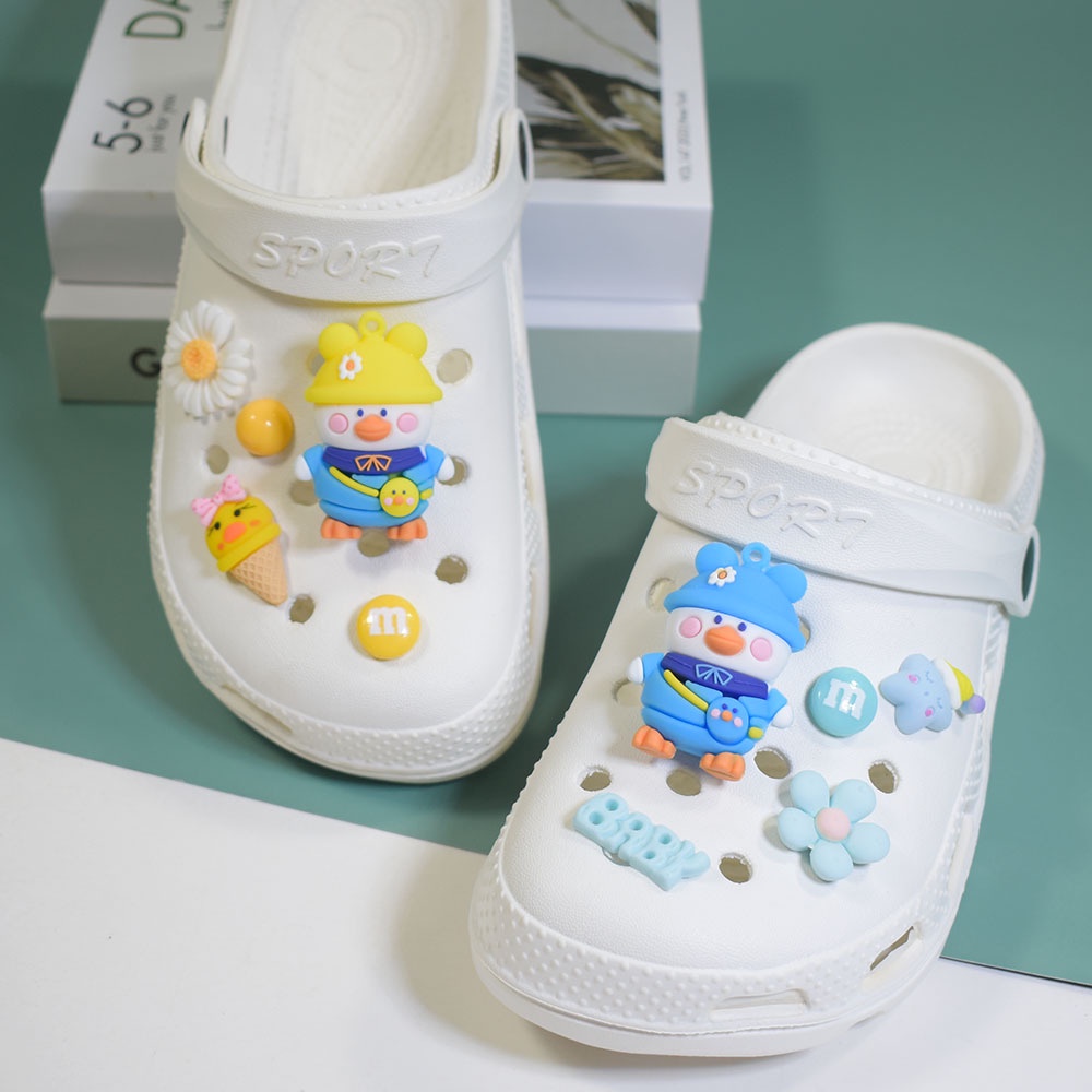 Set 10 Phụ Kiện Gắn Ba Lô / Giày Crocs / Túi Xách Hình Vịt Hoạt Hình Dễ Thương Cho Bé