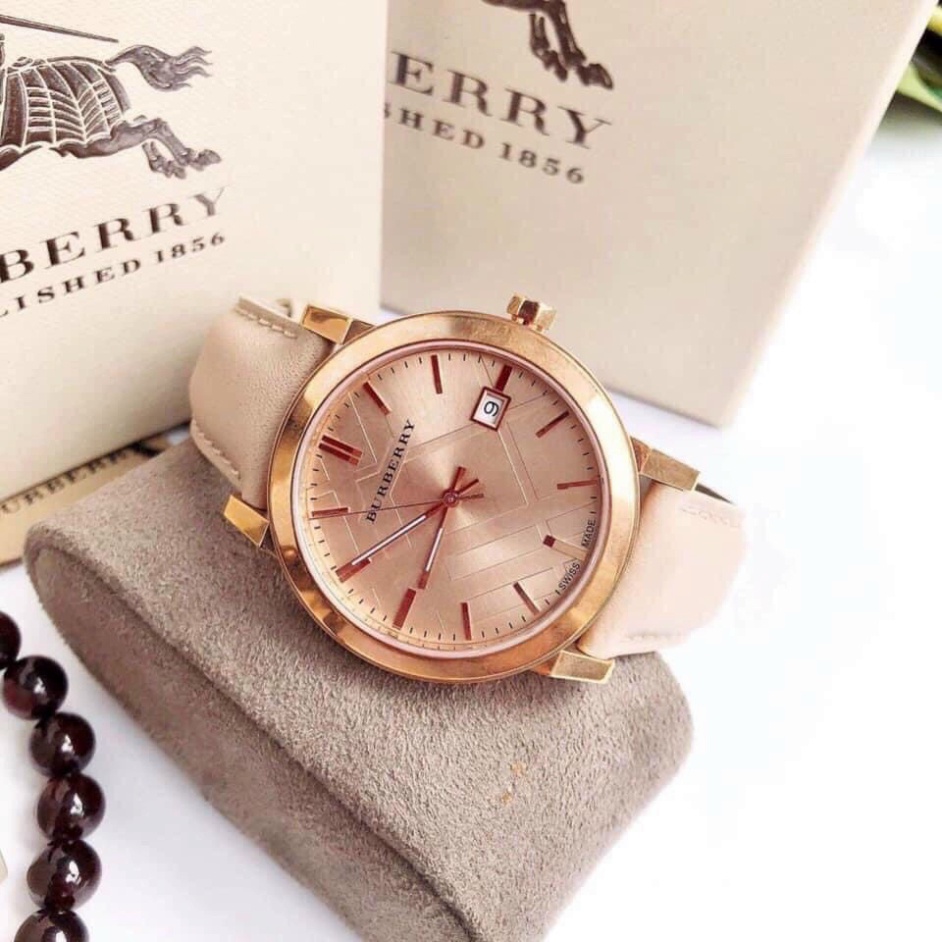Đồng hồ nữ Burbery - thời trang, sang trọng, dây da mềm màu kem, mặt thép hồng siêu xinh,