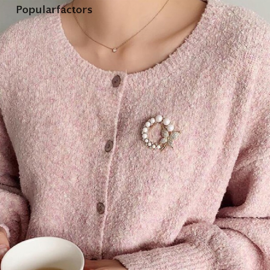 Ghim cài áo hình bướm và ngọc trai thanh lịch