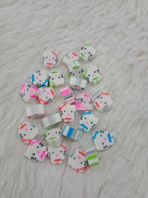 Gôm mini trong bình sữa Doraemon và Kitty 1cmx1cmx24 cục SP000029