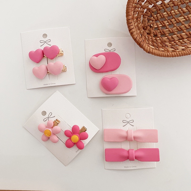 Set 2 kẹp tóc nhựa màu hồng cho bé