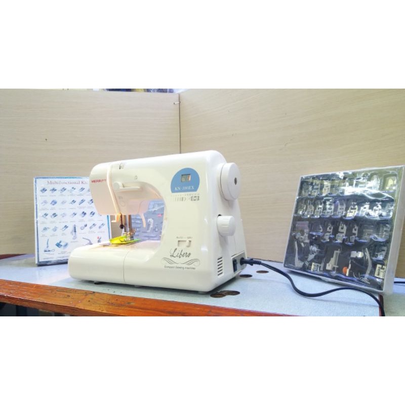 Máy may SINGER KN- 310 DX