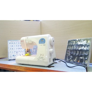 Máy may singer kn- 310 dx