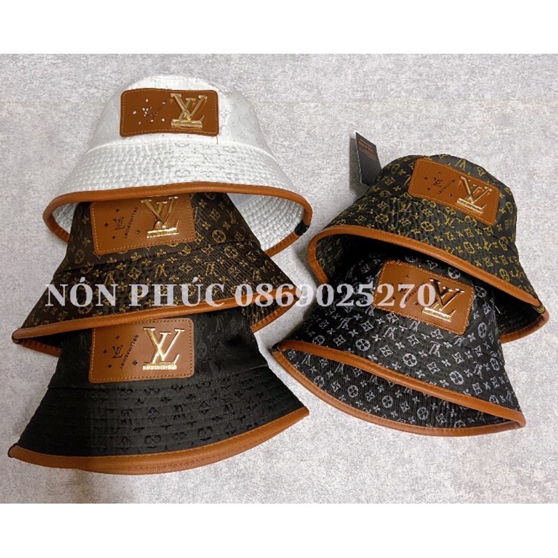 MŨ BUCKET VIỀN DA LOGO KIM LOẠI LV NAM NỮ