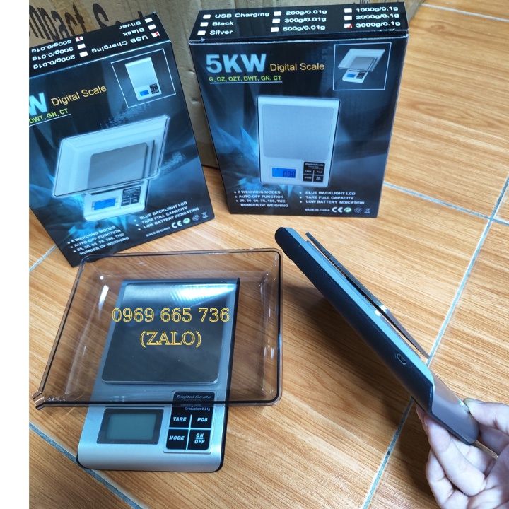Cân điện tử nhà bếp DH-5KW chính xác cao với các mức cân 500g/0,01g - 3kg/0,1g.Tặng kèm đĩa cân, dây sạc usb và pin aaa
