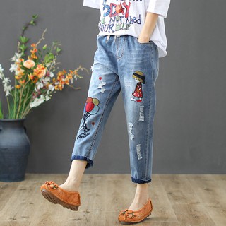 Women's jeans are plain, embroidered with personality tear patterns
