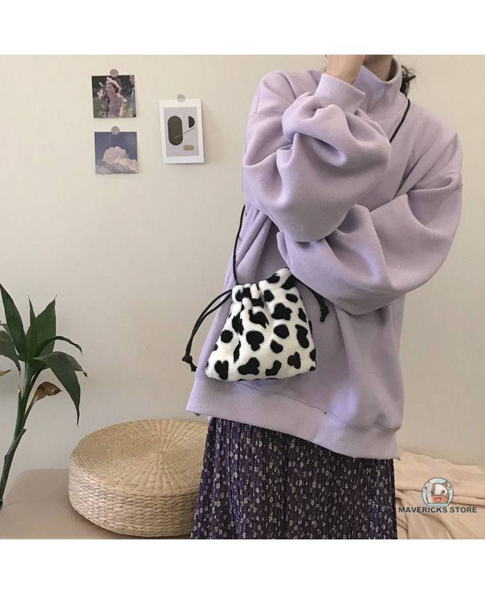 Túi đeo chéo dây rút họa tiết bò sữa cho nữ