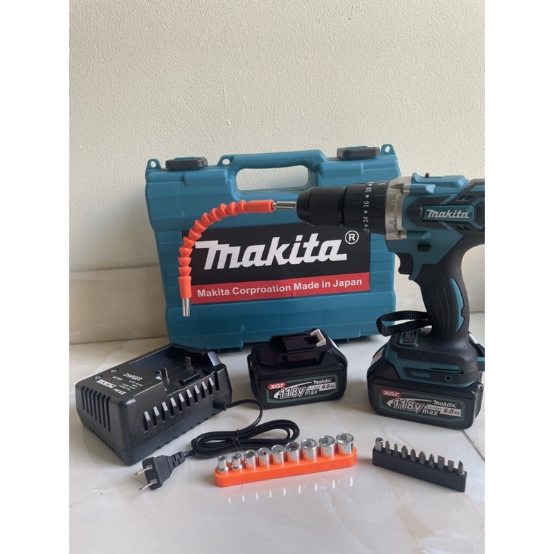 máy khoan pin makita 3 chức năng. bắn vít, bắn tôn, khoan tường,gỗ,bê tông. Malaysia,loai 1.tặng bộ phụ kiện 21 chi tiết