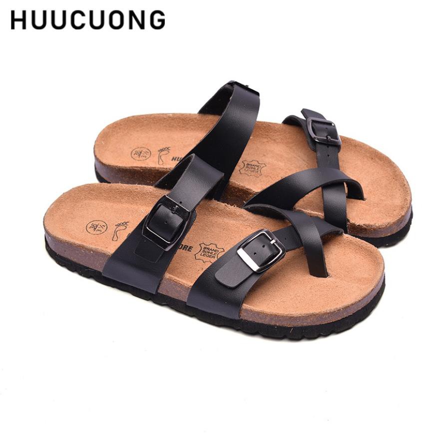 Dép unisex xỏ ngón Huucuong màu đen đế trấu