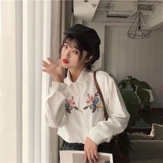 Áo sơ mi thêu hoa