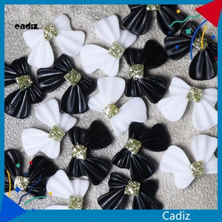 Charm nơ xinh lẻ 1 cái* 2 màu đen trắng