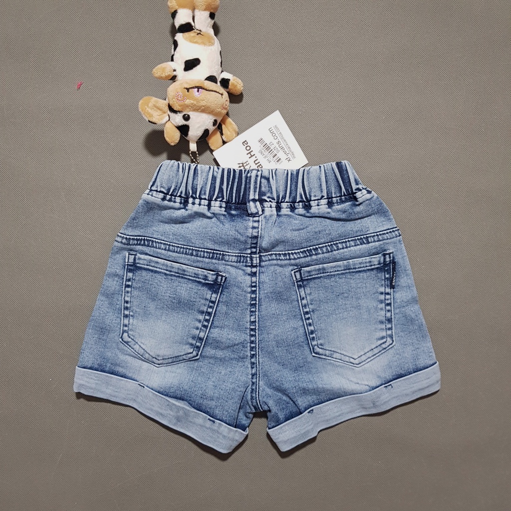 Quần short jean lật lai kèm phụ liện con bò dễ thương cho bé gái