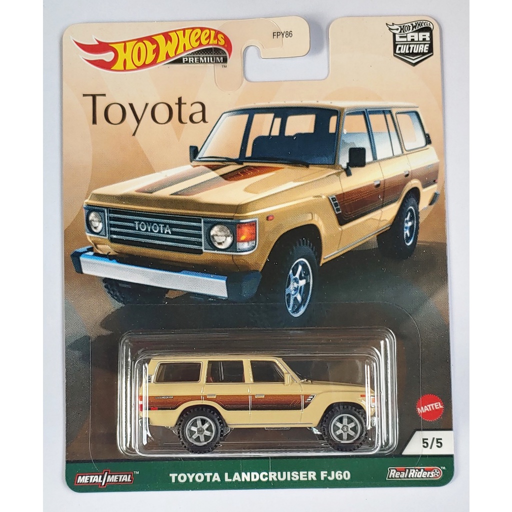 Xe mô hình tỉ lệ 1:64 HOT WHEELS PREMIUM bánh cao su T-23 Toyota Landcruiser FJ60