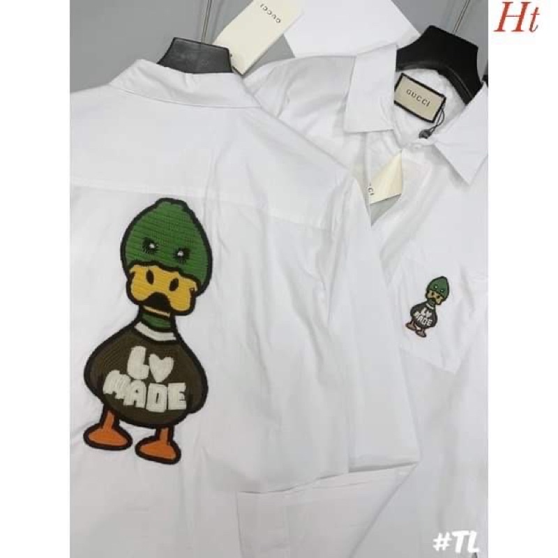 Áo sơ mi trắng dài tay vịt mũ xanh Ht