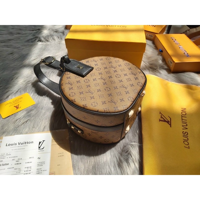 Túi quai xách tròn khoá bấm