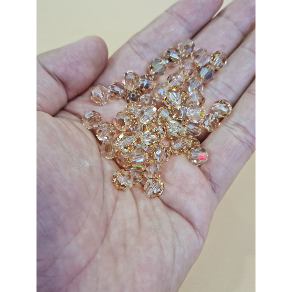 ĐÁ PHA LÊ SWAROVSKI TRÒN GIÁC LỚN MÀU TRÀ 8MM