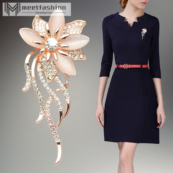 Ghim ga ̀ i a ́ o hi ̀ nh hoa đi ́ nh ngo ̣ c mă ́ t