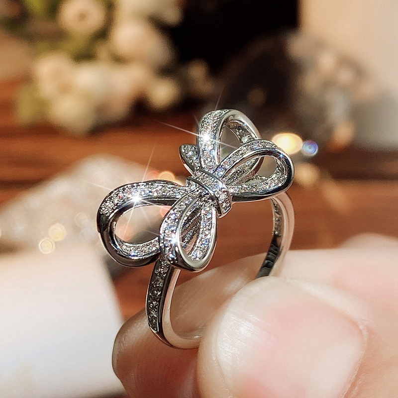 Nhẫn Đính Hôn Hình Nơ Lấp Lánh Sang Trọng Cho Nữ