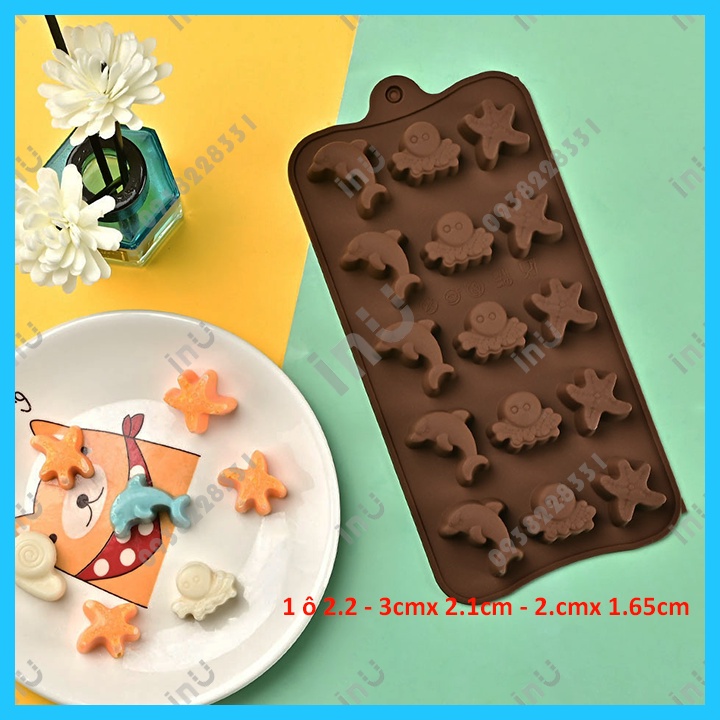 HCM - Khuôn silicon mẫu mới hoạt hình heo, doremon, gấu, cá heo, nhạc cụ làm socola, rau câu pudding, kẹo dẻo BSI