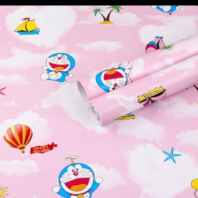 Decal giấy dán tường đô rê mon bãi biển hồng khổ 45cm keo sẵn