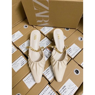 Sục Zara. quai xích