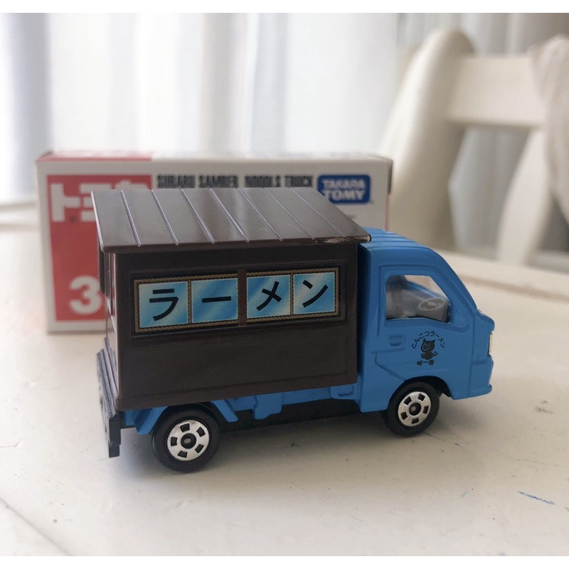 Xe mô hình tomica mẫu xe tải Subaru bán mì- Có hộp